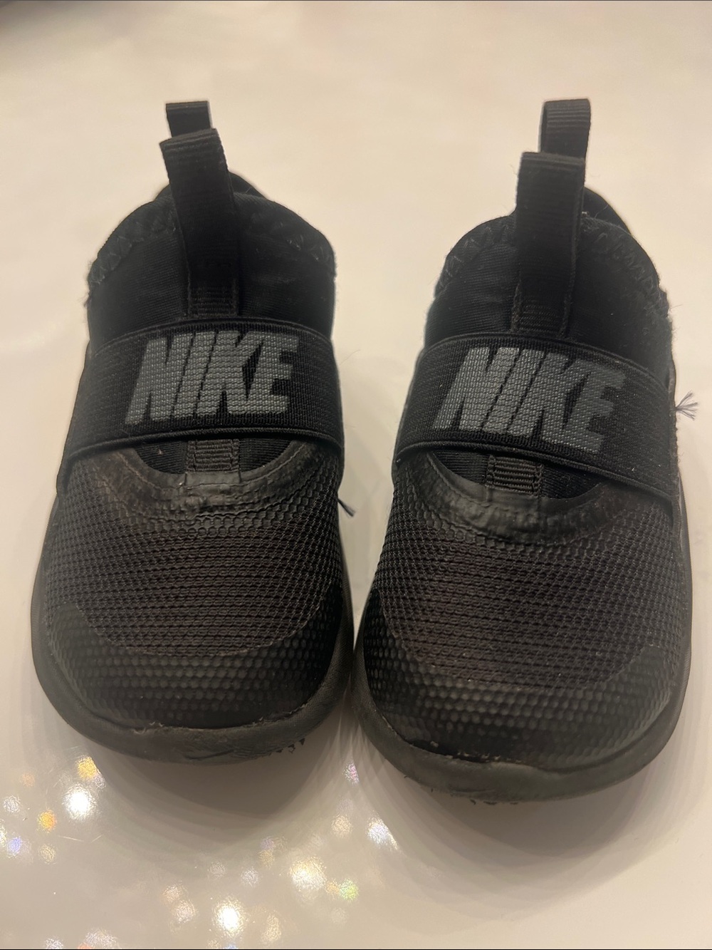Nike Kids Black Slip-On Sneakers with Elastic Logo Strap